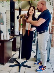 Racoon Creative Director at a hair extensions training